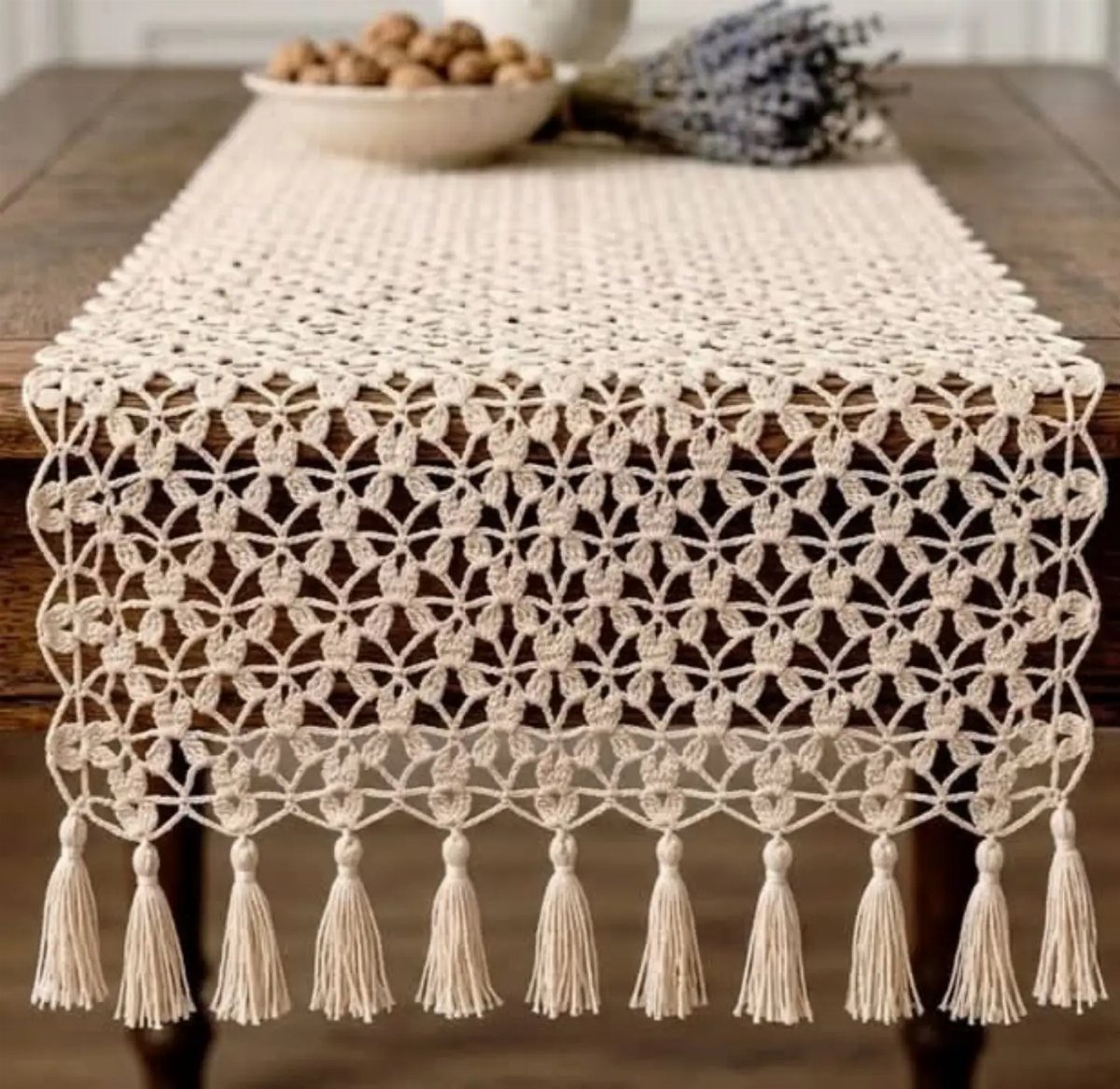 Bohemian Chic Wedding Ideas: 5 Looks and Details 2 Cream macramé table runner with tassels on a dark rustic wooden table