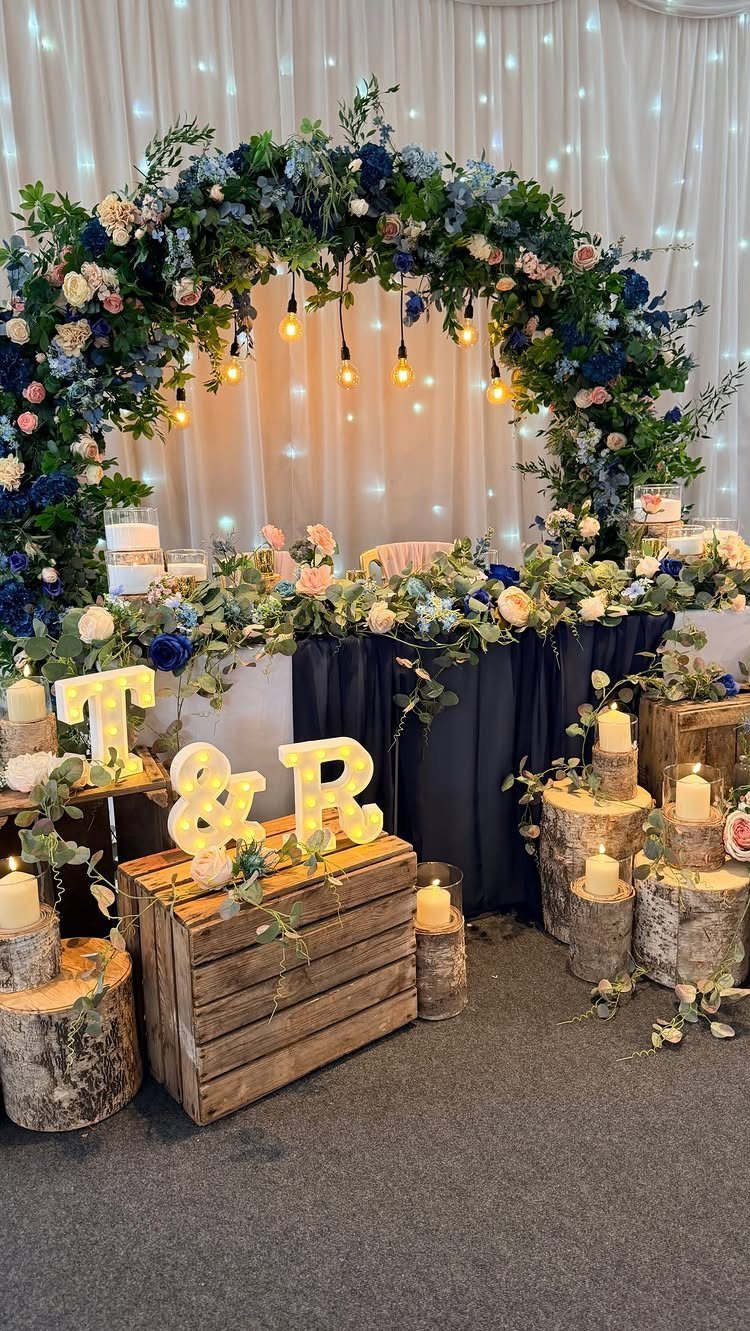 Colour Scheme for Wedding: 15 Ideas and Palettes 2 Navy blue and blush pink floral wedding arch with illuminated letters and candles.