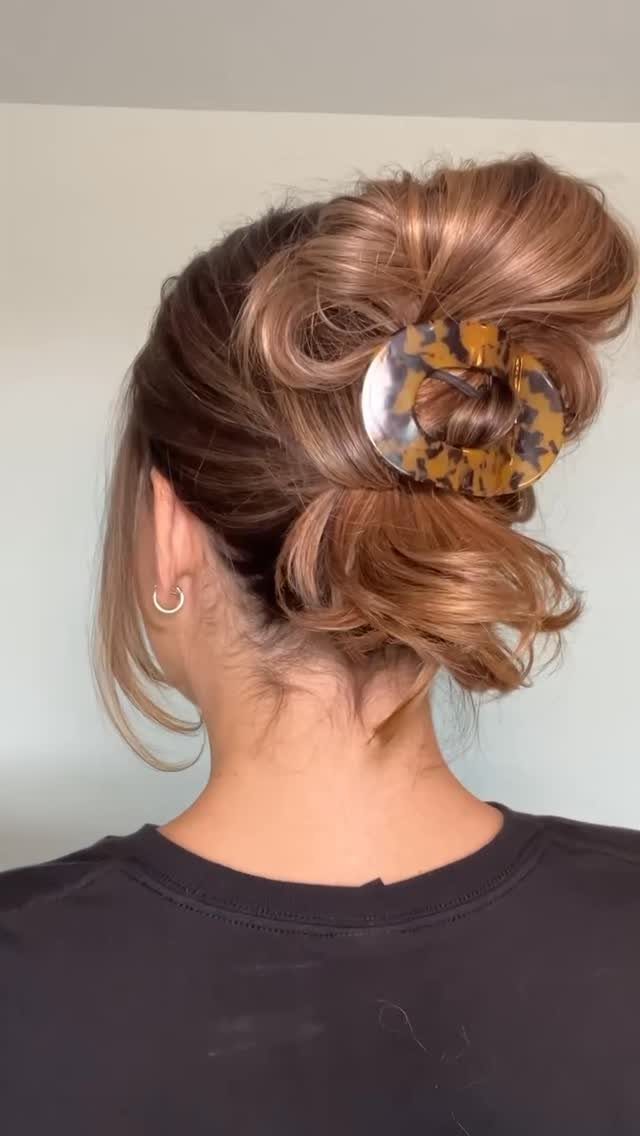 14 Ideas for Hair for a Wedding Guest, From Buns to Waves 14 Light brown hair in a loose updo secured with a tortoiseshell hair clip.