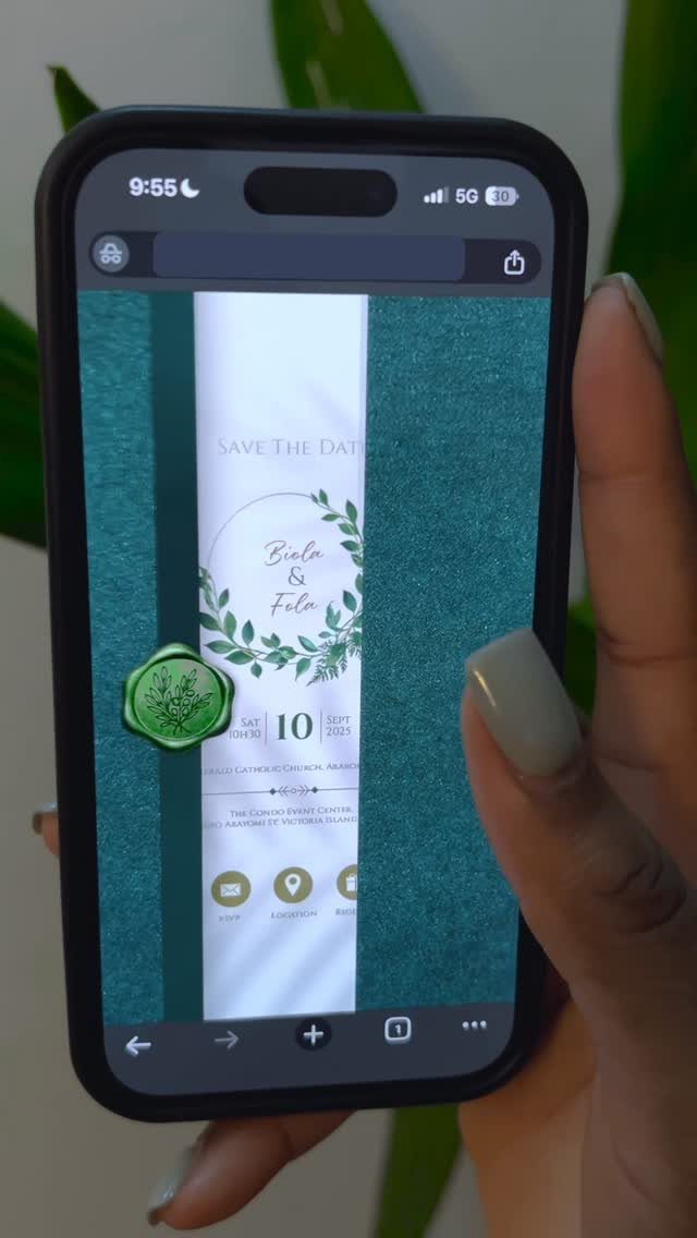 Save the Date Wedding Invite Ideas: 11 Styles to Try 8 Smartphone screen displaying a digital save the date invitation with green botanical elements.