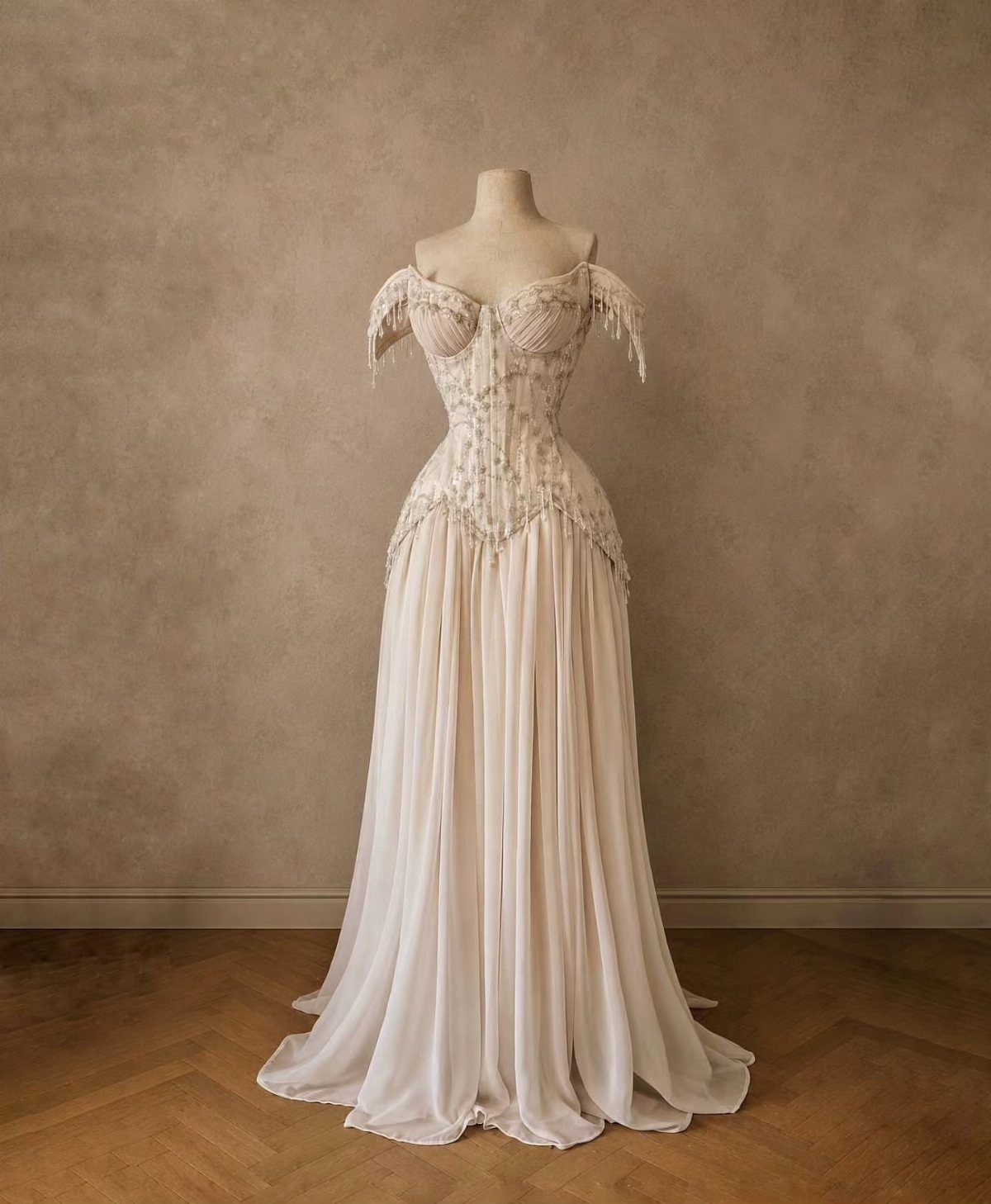 9 Ideas for a Vintage Basque Waist Wedding Dress 4 Off-white wedding dress with beaded corset boning and a V-shaped basque waistline.