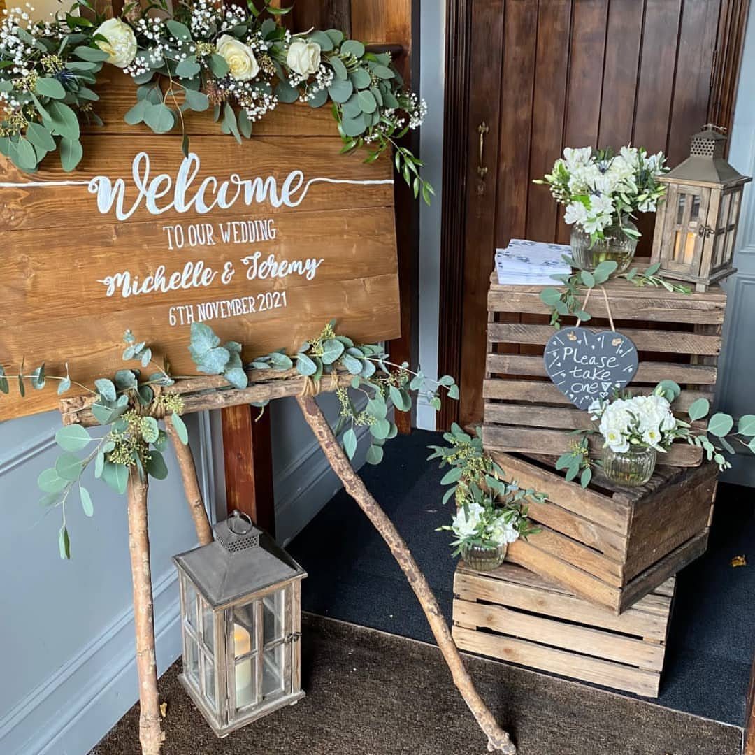 19 Wedding Decorations at Home: DIY Ideas to Try 2 Rustic wooden wedding welcome sign on a branch easel with white floral arrangements