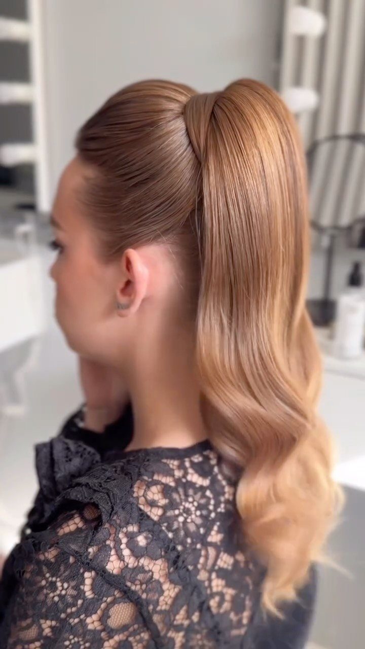 Wedding Hair Styles for Straight Hair: 9 Ideas 1 High voluminous ponytail with a puffed crown on a woman with light brown hair.