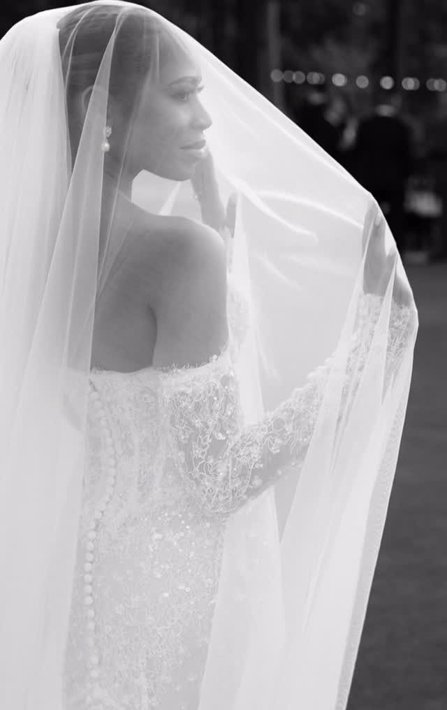 17 Wedding Ideas Pictures to Show Your Photographer 2 Bride in a lace wedding dress and sheer veil posing for a portrait.