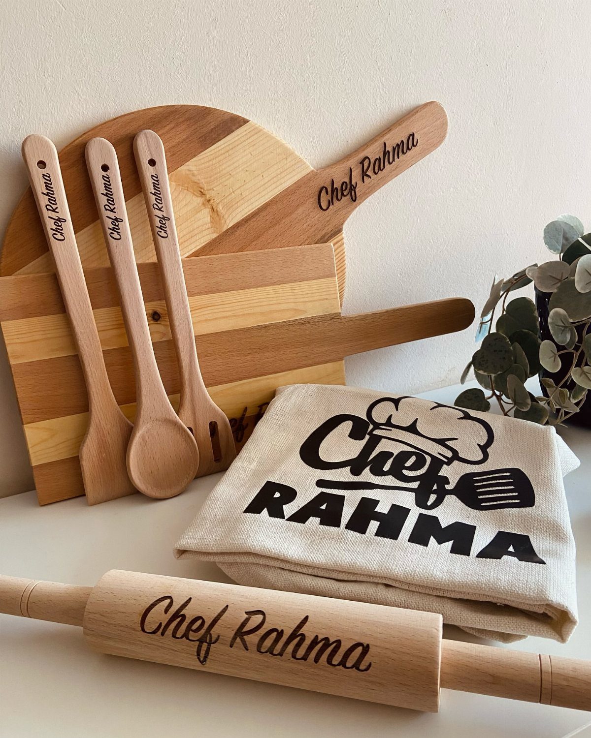 22 Wedding Present Ideas for Couples to Treasure 2 Personalized wooden kitchen set and apron engraved with the name Chef Rahma