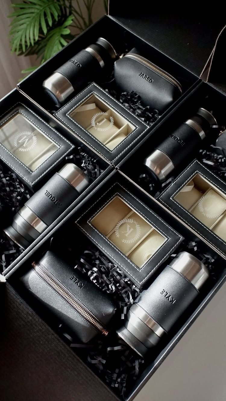 22 Wedding Present Ideas for Couples to Treasure 14 Personalized gift sets with tumblers and leather pouches in a black gift box.